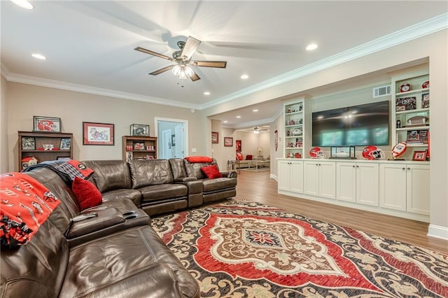5515 Cheatam Ave, Cumming, GA 30040 - living room featuring ceiling fan, light wood-type flooring, ornamental molding, and recessed lighting