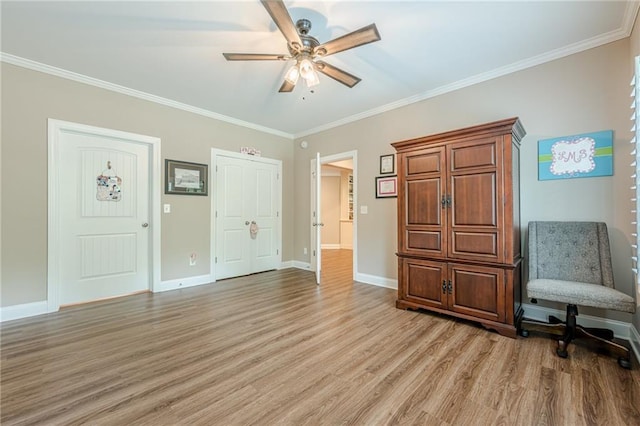 5515 Cheatam Ave, Cumming, GA 30040 - sitting room featuring light wood-type flooring, ceiling fan, and ornamental molding