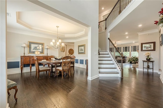5515 Cheatam Ave, Cumming, GA 30040 - dining room with stairs, hardwood / wood-style flooring, ornamental molding, a chandelier, and a raised ceiling