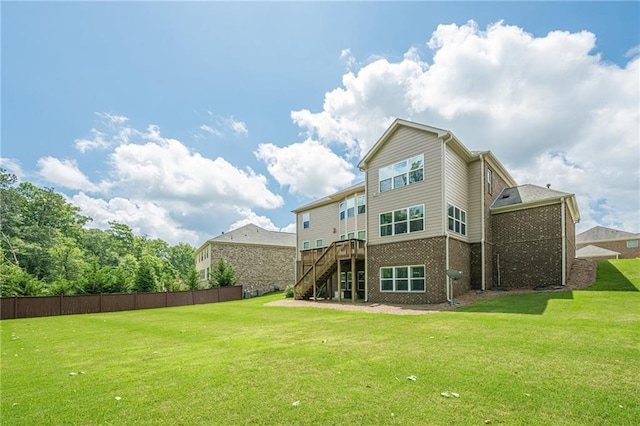 5515 Cheatam Ave, Cumming, GA 30040 - rear view of property featuring stairway, brick siding, and a deck