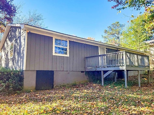 1946 Singer Way, Lithonia, GA 30058 - view of home's exterior featuring a deck