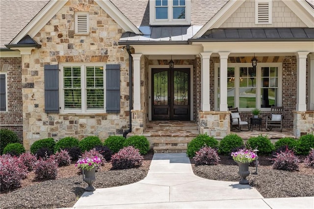 341 Carl Sanders Dr, Acworth, GA 30101 - entrance to property with a standing seam roof, french doors, covered porch, and stone siding