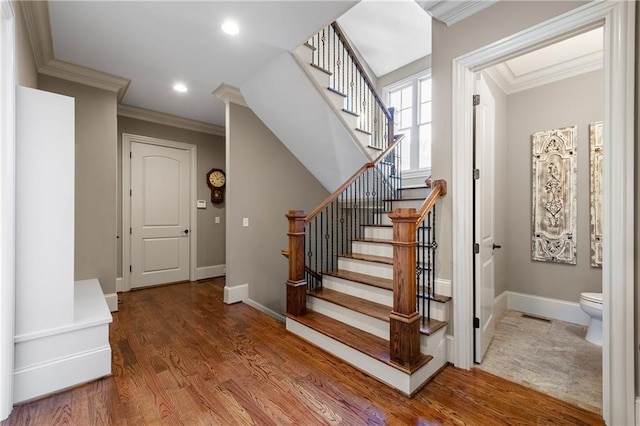 341 Carl Sanders Dr, Acworth, GA 30101 - staircase with crown molding, wood finished floors, and recessed lighting