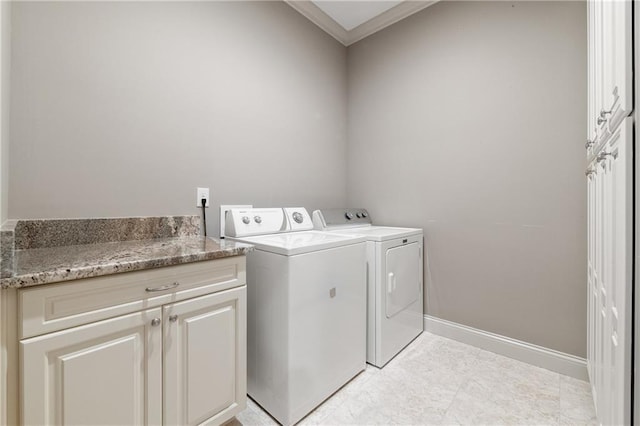 341 Carl Sanders Dr, Acworth, GA 30101 - laundry room featuring washer and dryer, ornamental molding, and cabinet space