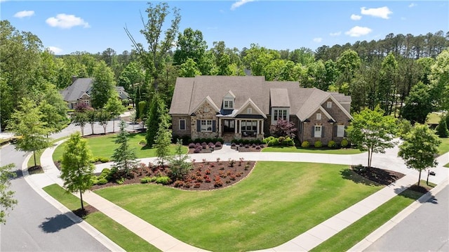 341 Carl Sanders Dr, Acworth, GA 30101 - view of front of home featuring a front yard, stone siding, and curved driveway