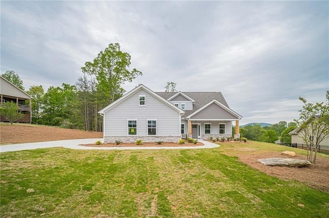 view of front of home with a front lawn