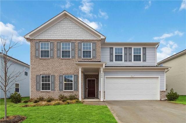 view of front of property with a garage and a front lawn