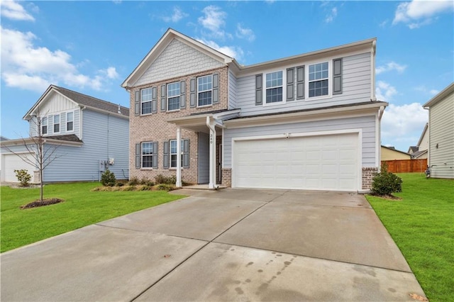 view of front of house featuring a garage and a front yard