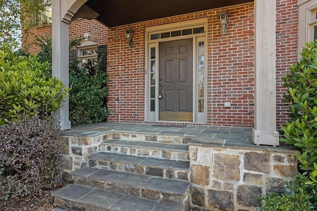 doorway to property featuring a porch