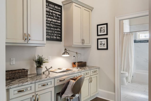 home office featuring built in desk