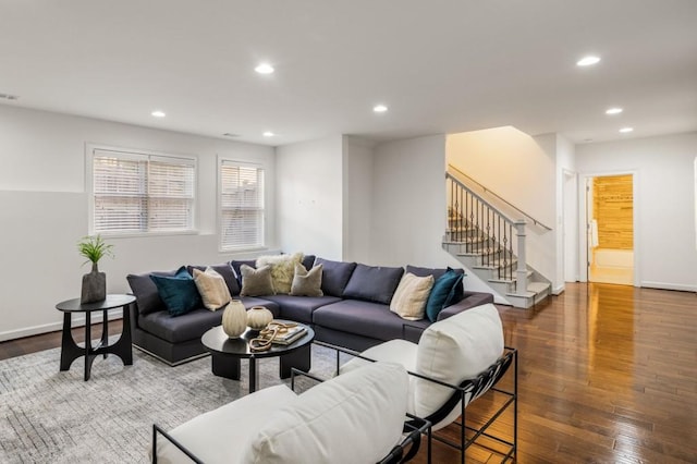 living room with dark hardwood / wood-style floors