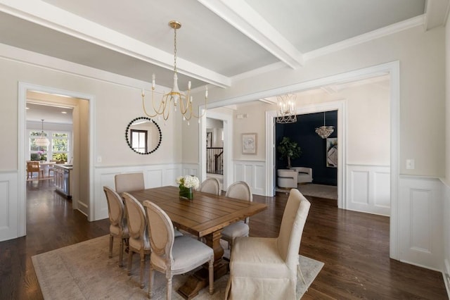 dining room featuring beamed ceiling, ornamental molding, dark hardwood / wood-style flooring, and an inviting chandelier