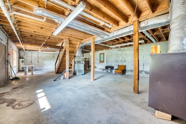 basement featuring electric water heater