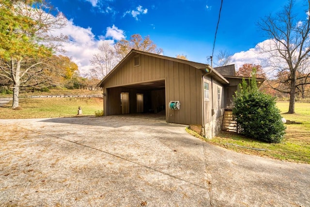 view of side of property with a garage