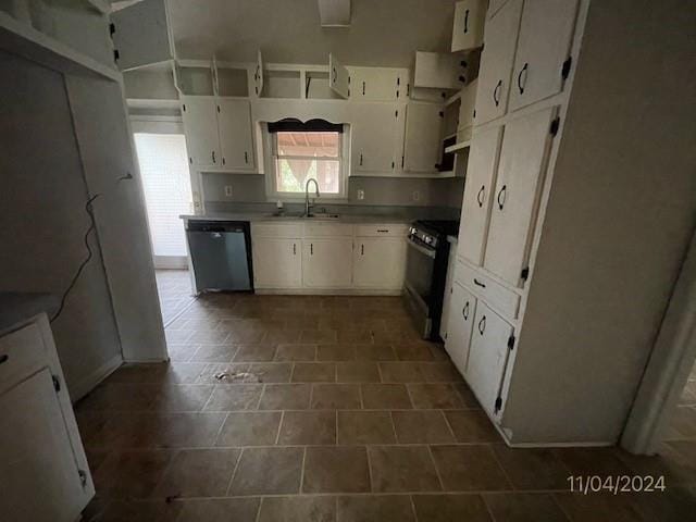 kitchen with white cabinets, appliances with stainless steel finishes, and sink