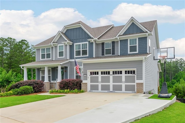 48 Violet Ln, Dallas, GA 30132 - craftsman-style home featuring board and batten siding, concrete driveway, an attached garage, covered porch, and a front yard