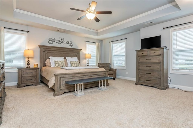 48 Violet Ln, Dallas, GA 30132 - bedroom featuring a tray ceiling, ornamental molding, light carpet, baseboards, and multiple windows