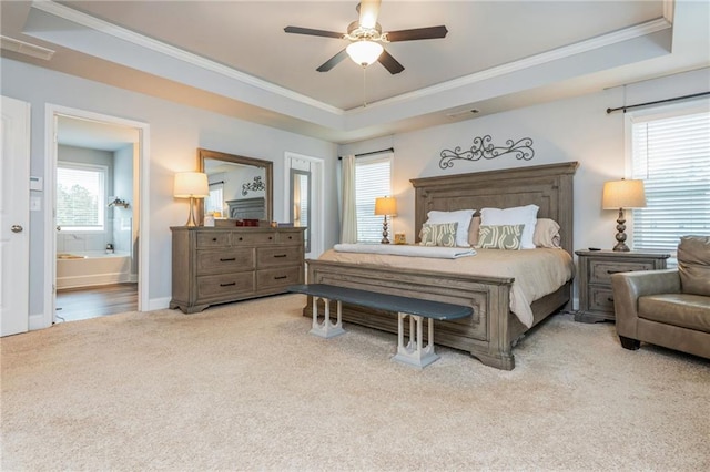 48 Violet Ln, Dallas, GA 30132 - carpeted bedroom featuring a tray ceiling, ornamental molding, a ceiling fan, and baseboards