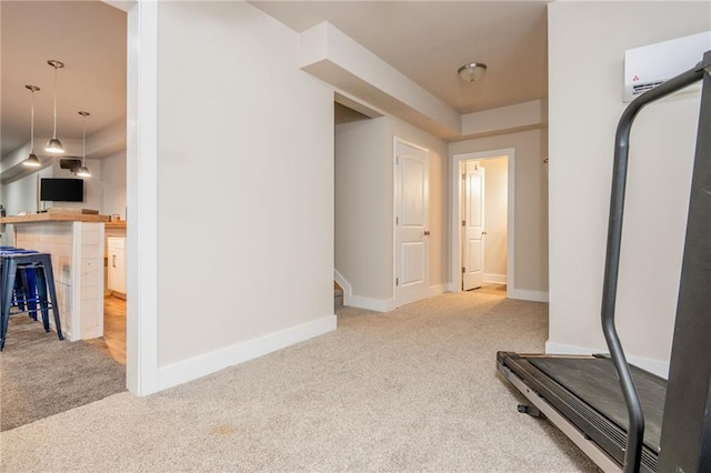 48 Violet Ln, Dallas, GA 30132 - workout area featuring carpet flooring, a wall mounted air conditioner, and baseboards