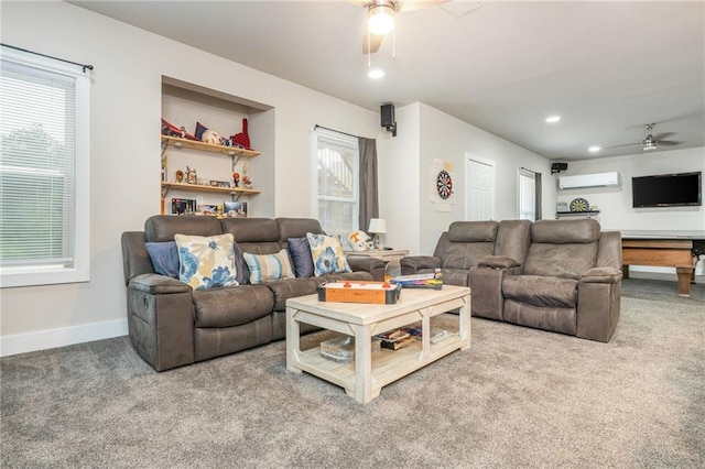48 Violet Ln, Dallas, GA 30132 - carpeted living room featuring a ceiling fan, a wall mounted AC, healthy amount of natural light, recessed lighting, and baseboards