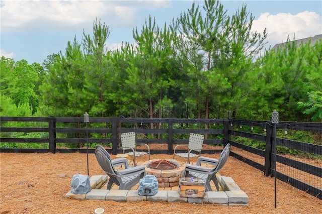 48 Violet Ln, Dallas, GA 30132 - view of patio / terrace featuring an outdoor fire pit