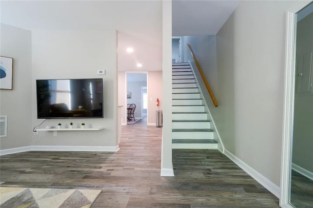 554 Holderness St SW, Atlanta, GA 30310 - stairs featuring baseboards, visible vents, and wood finished floors