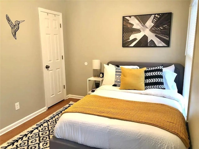 554 Holderness St SW, Atlanta, GA 30310 - bedroom with baseboards and wood finished floors