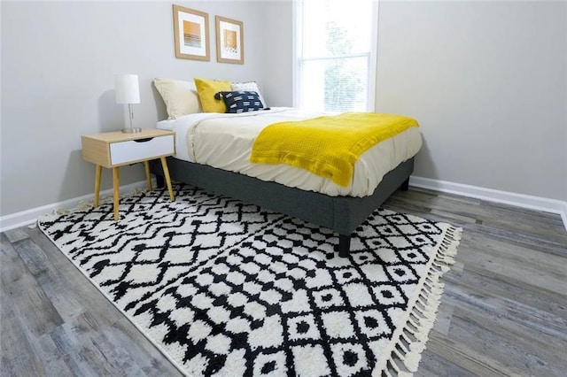 554 Holderness St SW, Atlanta, GA 30310 - bedroom with baseboards and wood finished floors