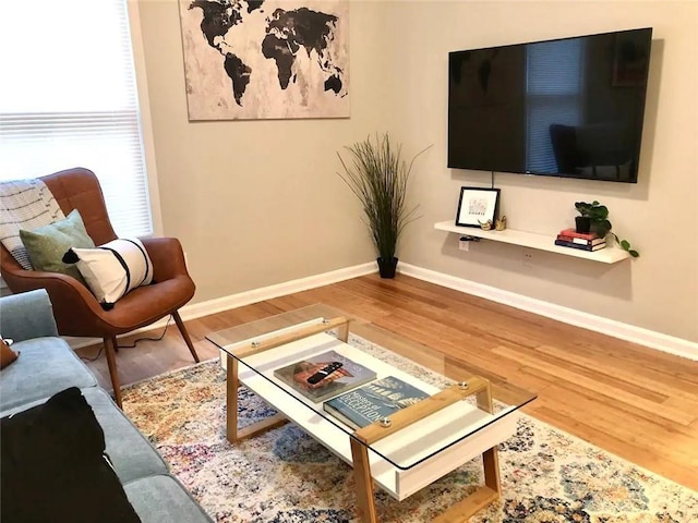 554 Holderness St SW, Atlanta, GA 30310 - living area with baseboards and wood finished floors