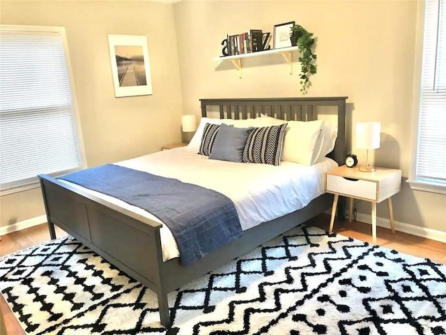 554 Holderness St SW, Atlanta, GA 30310 - bedroom featuring baseboards and wood finished floors