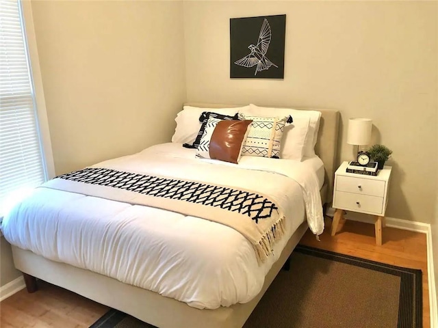 554 Holderness St SW, Atlanta, GA 30310 - bedroom with baseboards and wood finished floors