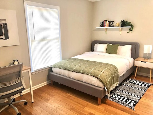554 Holderness St SW, Atlanta, GA 30310 - bedroom featuring baseboards and wood-type flooring