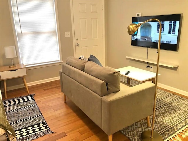 554 Holderness St SW, Atlanta, GA 30310 - living area with baseboards and wood finished floors