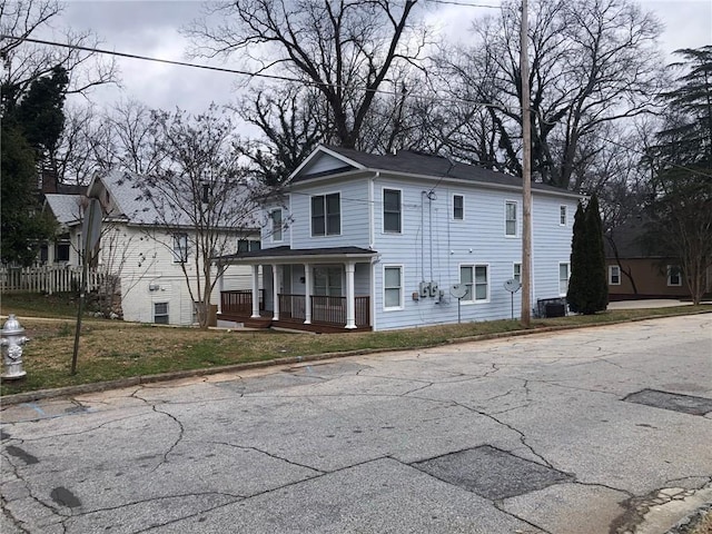 554 Holderness St SW, Atlanta, GA 30310 - view of front of home with a front yard, cooling unit, and a porch