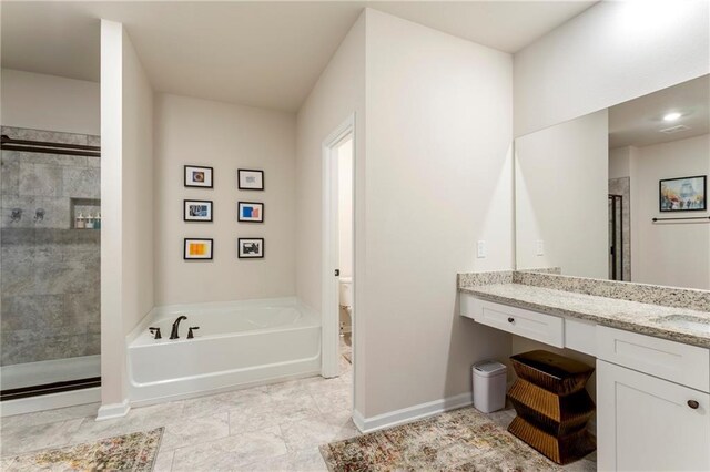 full bathroom with separate shower and tub, vanity, and toilet