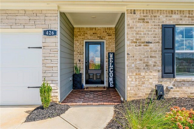 entrance to property featuring a garage