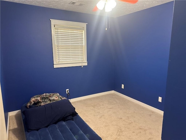2943 E Howell Dr, Lawrenceville, GA 30044 - carpeted bedroom with a textured ceiling, baseboards, and visible vents