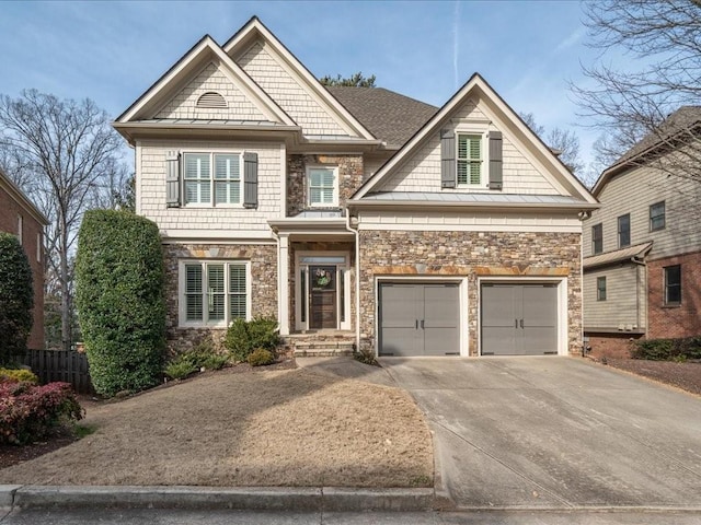 craftsman house with a garage