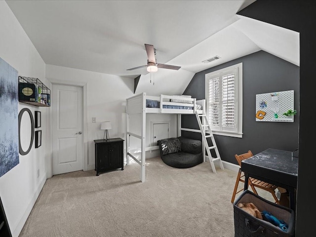 carpeted bedroom with lofted ceiling and ceiling fan