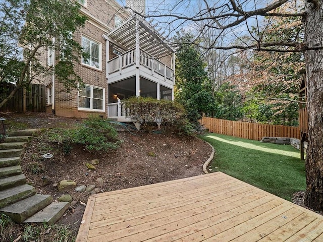 deck featuring a yard