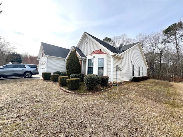 view of home's exterior with a garage