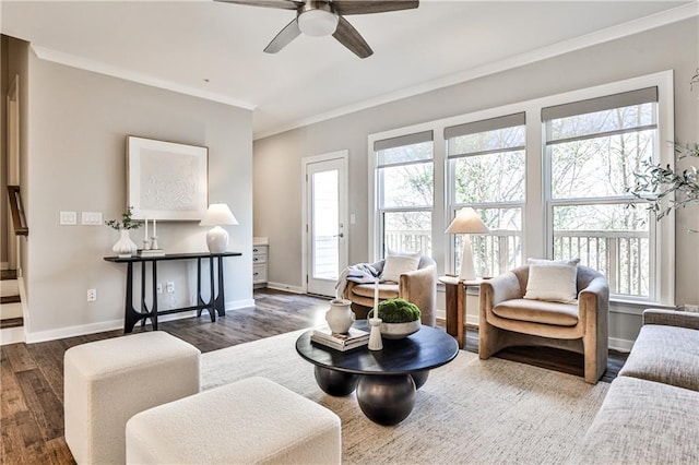 living room featuring crown molding, stairway, wood finished floors, and baseboards