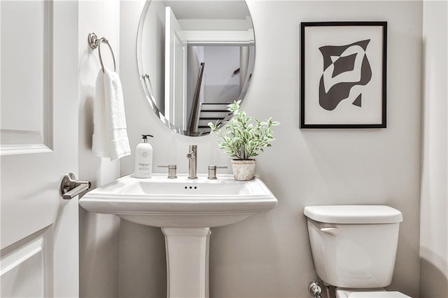 bathroom featuring toilet