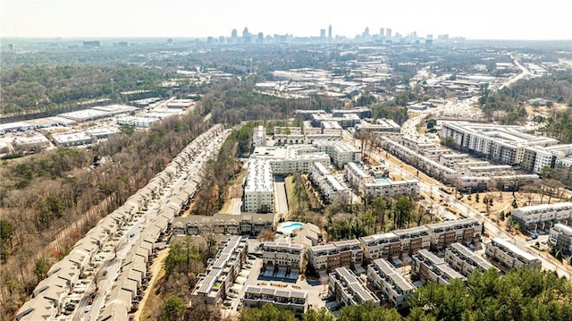 birds eye view of property with a city view