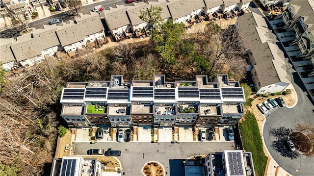 aerial view of property's location featuring nearby suburban area