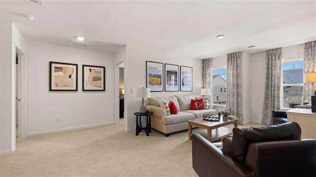 living room with light colored carpet