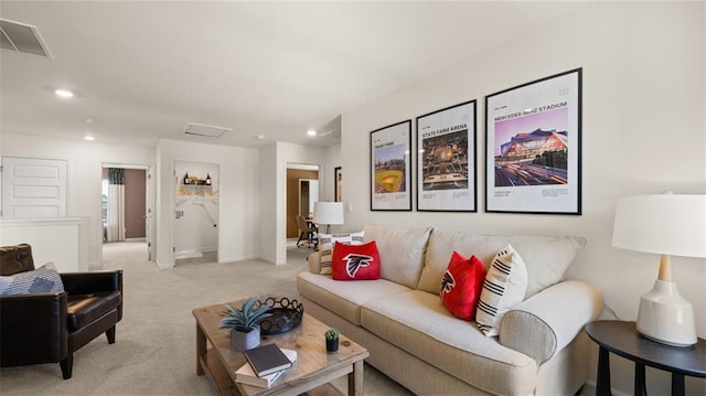 living room with light colored carpet