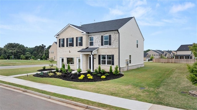 view of front of property featuring a front lawn