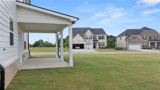 view of yard with a garage