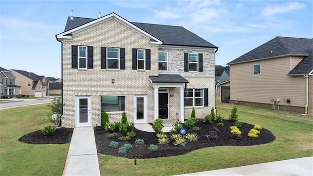 view of front of home with a front lawn